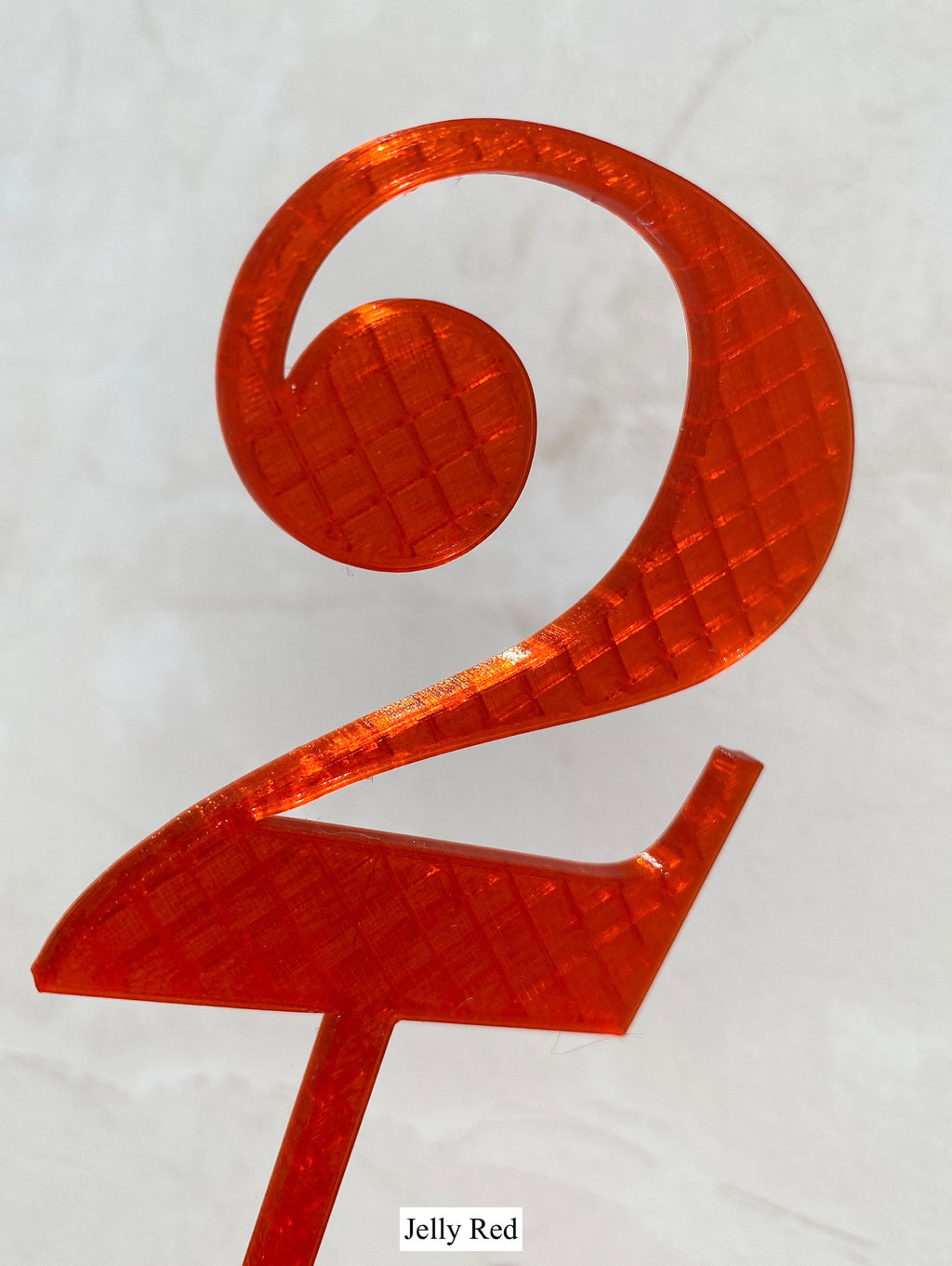 Jelly red number 2 cake topper close-up