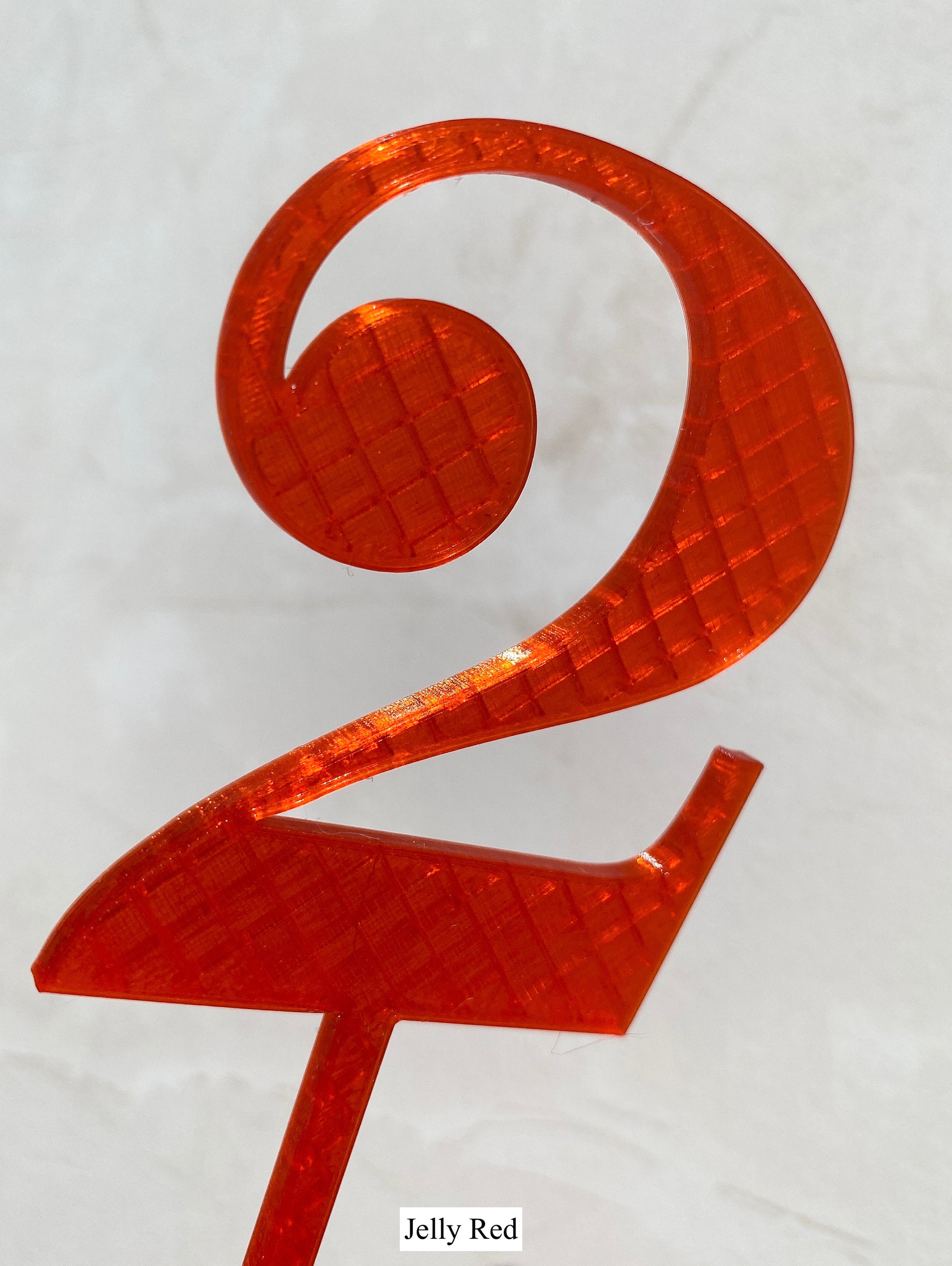 Jelly red number 2 cake topper close-up