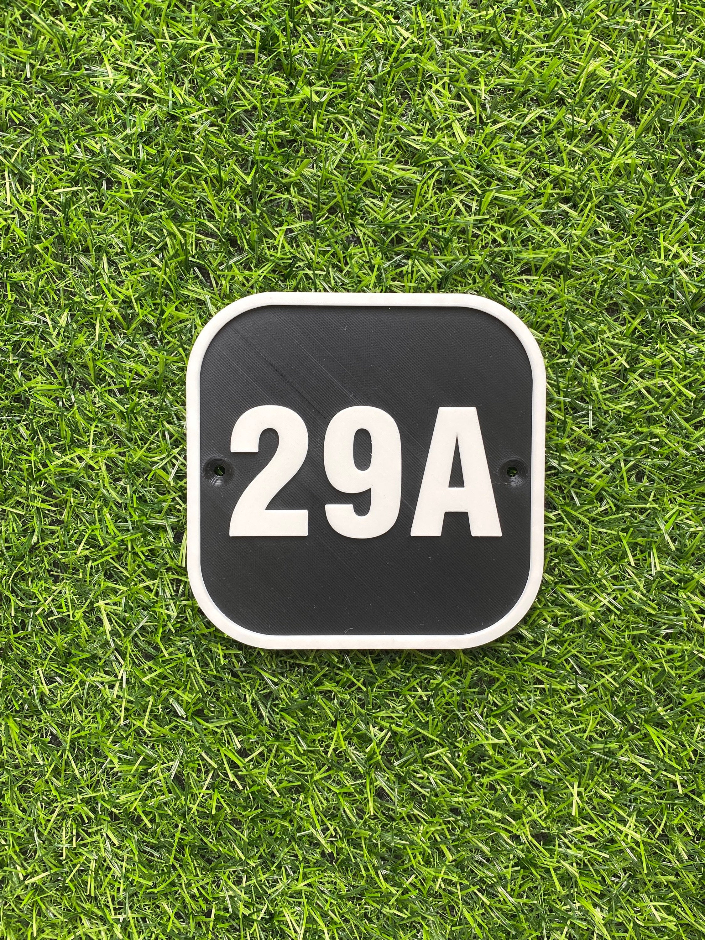 Black and white house door number 29A
