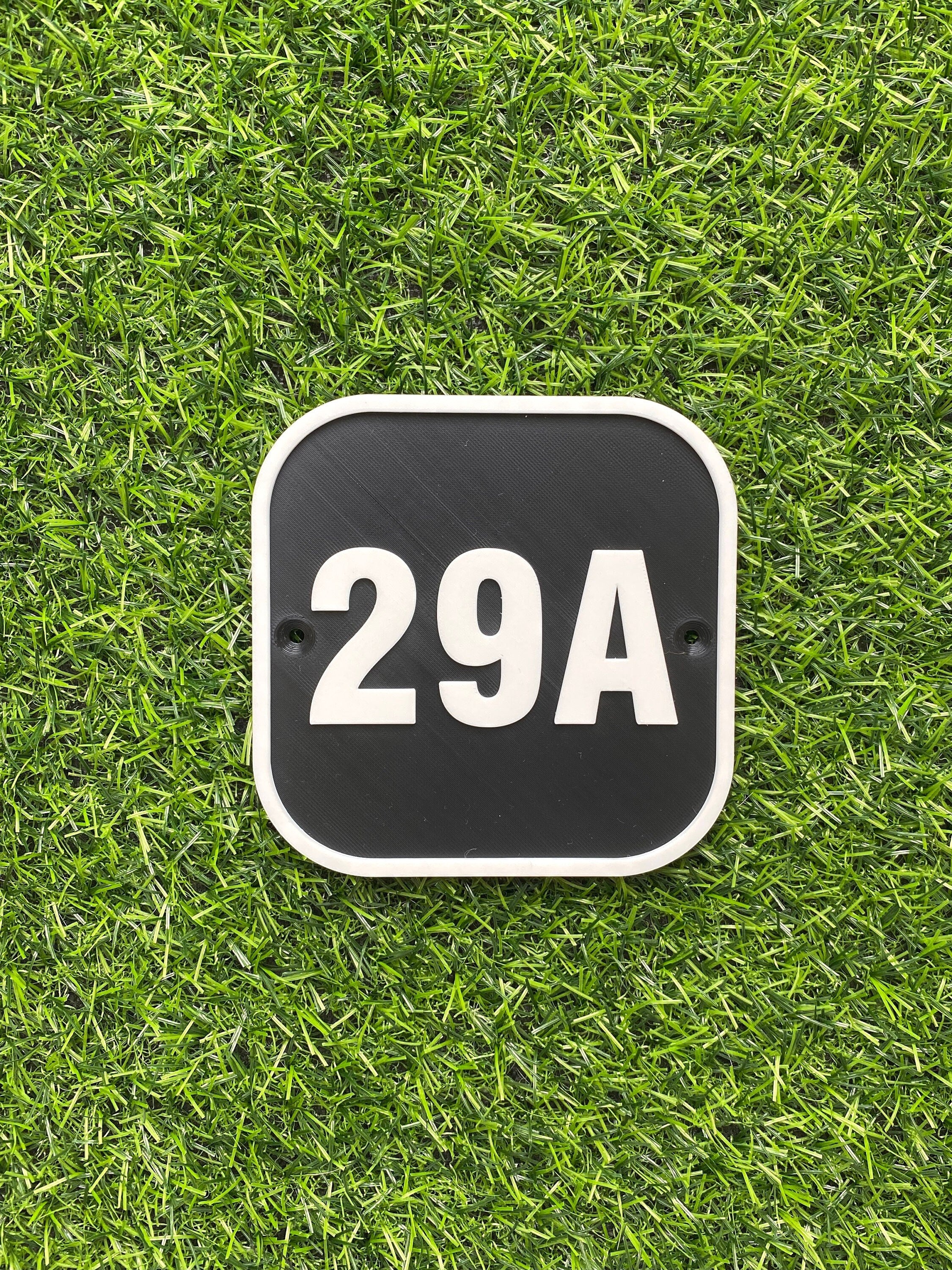 Personalised square house door number sign in black and bronze