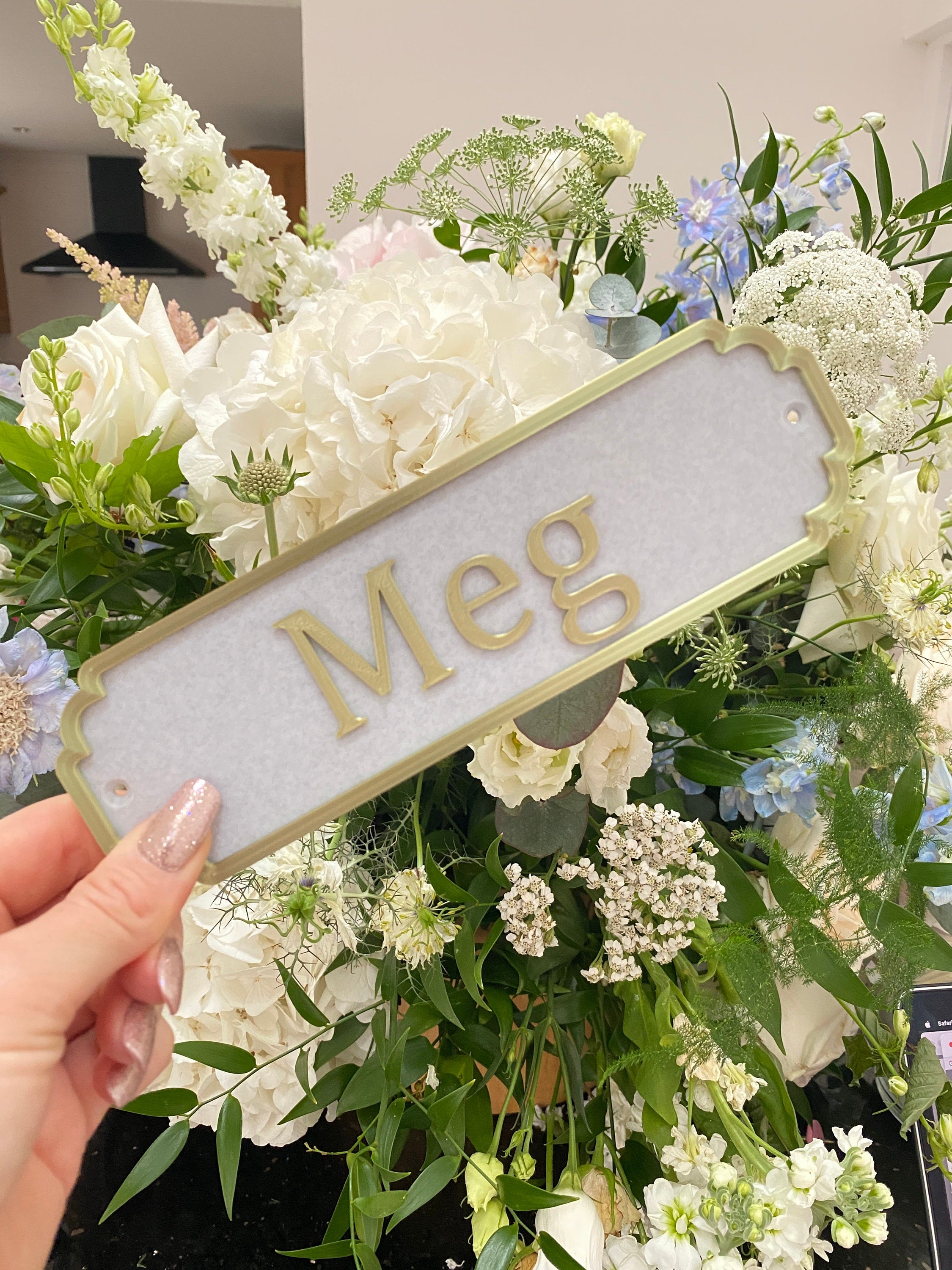 Personalised classic door sign with bronze lettering on black background
