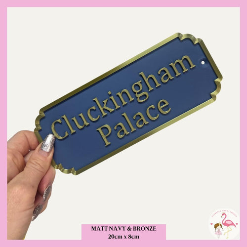 Cluckingham Palace chicken coop sign in black and silver