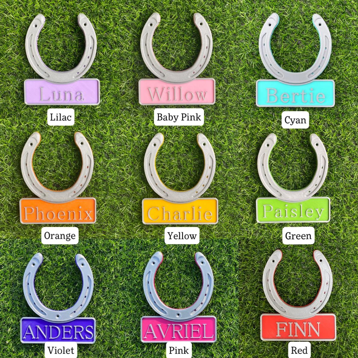 Nine colour options for the horseshoe name plate: lilac, baby pink, cyan, orange, yellow, green, violet, pink and red