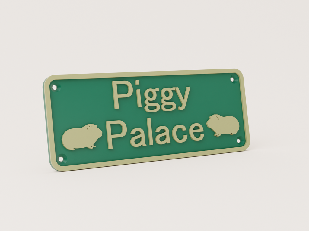 Guinea pig house sign seen from an angle, showing the raised lettering and screw holes
